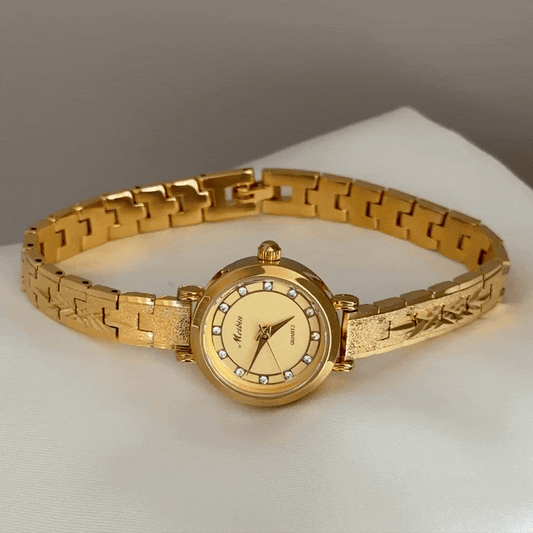 Modern Opulence: Gold Round Dial Watch with Gold Bezel & Stainless Steel Bracelet