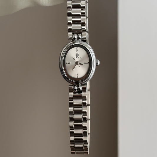 Elegant Silver Oval Dial Watch – Silver Bezel & Silver Stainless Steel Bracelet Quartz