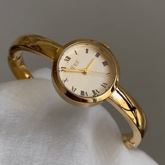 Luxury Gold Bangle Quartz Watch with Round Roman Dial for Women