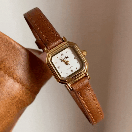 Vintage Poise - Bruin lederen vierkant horloge in goud
