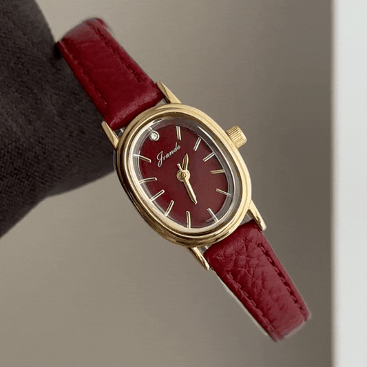 Feminine Elegance: Red Oval Dial with Gold Bezel & Leather Strap