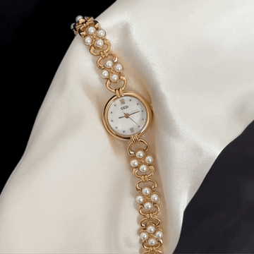Radiant Brilliance White Oval Mother-of-Pearl Dial Gold Diamond Watch