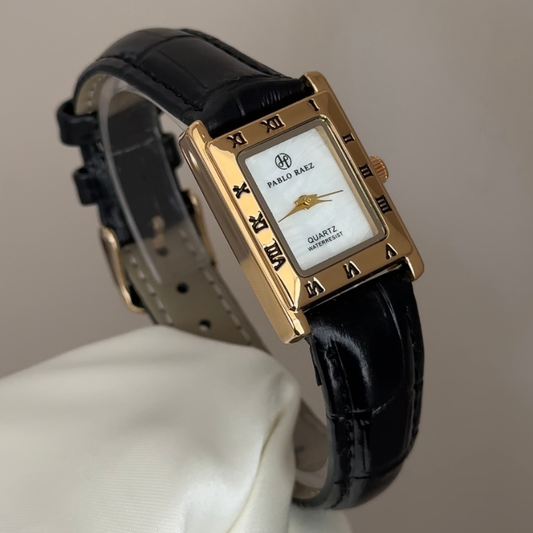 Contemporary Classic: White Rectangular Dial Watch with Gold-Tone Bezel & Black Leather Strap