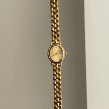 Elegant Gold Oval Dial Alloy Bracelet Watch - Daily Wear Edition