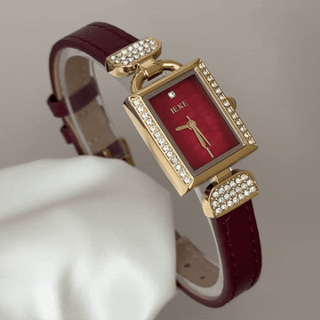 Vintage Charm: A Ruby Red & Gold Gemstone Rectangular Watch