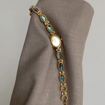 Estilo de brazalete de oro con incrustación de concha de abulón y reloj de cuarzo de mujeres ovaladas vintage