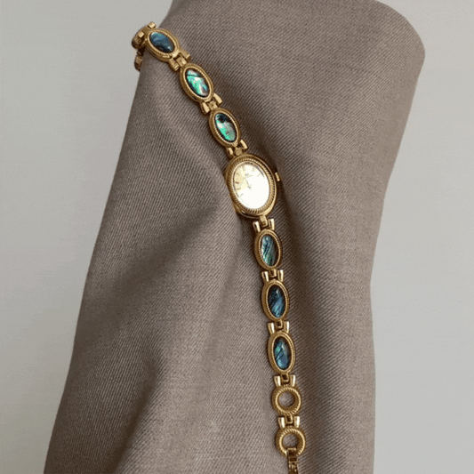 Estilo de brazalete de oro con incrustación de concha de abulón y reloj de cuarzo de mujeres ovaladas vintage