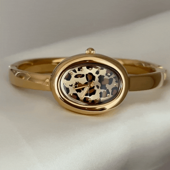 gold leopard oval dial bangle watch women  