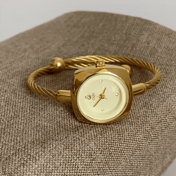 gold round bangle watch women