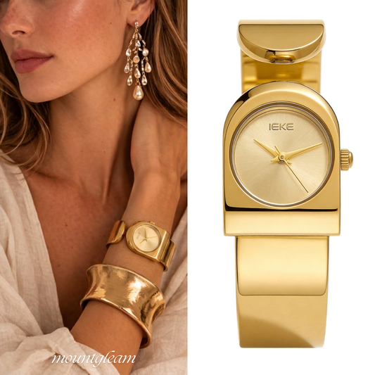 Statement Boldness: Luxurious Gold Round Dial Watch with Gold Cuff Bracelet