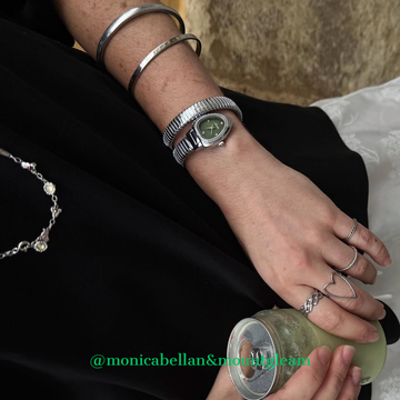 silver snake head bangle watch green dial
